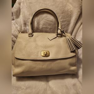 Beautiful,  classy,  roomy medium size Coach Purse. Ivory color.